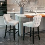 Velvet padded wing back bar stool with wooden leg chrome nail head decoration (set of 2))