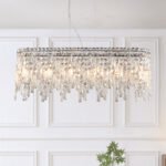 Silver elegant oval pendant light with reflective suspended crystal