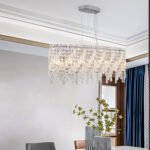 Silver elegant oval pendant light with reflective suspended crystal - Image 3
